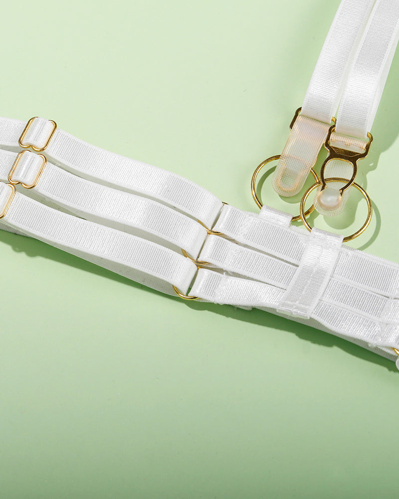 White lingerie back strap with gold-tone rings and clasp adjusters