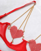 Red mesh heart chain bra with gold-tone chain straps and red bow detail