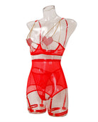 Red sheer lingerie set on mannequin: heart chain bra and garter shorts