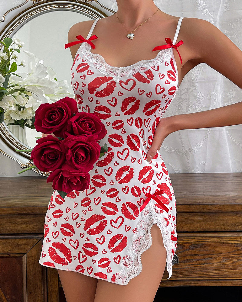 Red lip and heart print chemise with white lace trim and scalloped hem, red bow straps