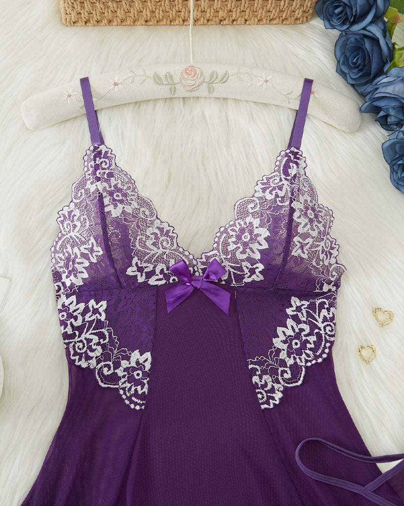 Purple lace babydoll close-up with white lace trim and bow at neckline