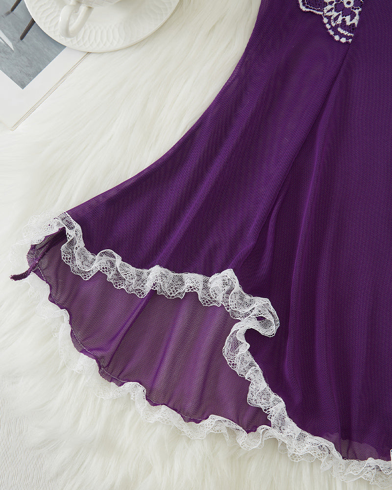 Purple babydoll skirt close-up with white scalloped lace hem and layered ruffle edge