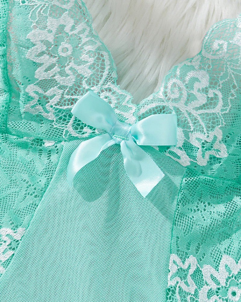 Mint green lace babydoll bodice close-up with ribbon bow and scalloped lace trim