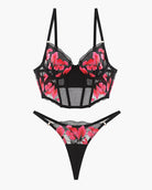 Black floral embroidered corset bra and thong set with mesh panels and adjustable straps