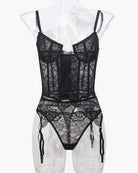 Black lace push-up corset bra with garter straps and matching panty set, front view