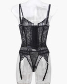 Black lace corset bra and garter panty set with vertical back paneling, rear view