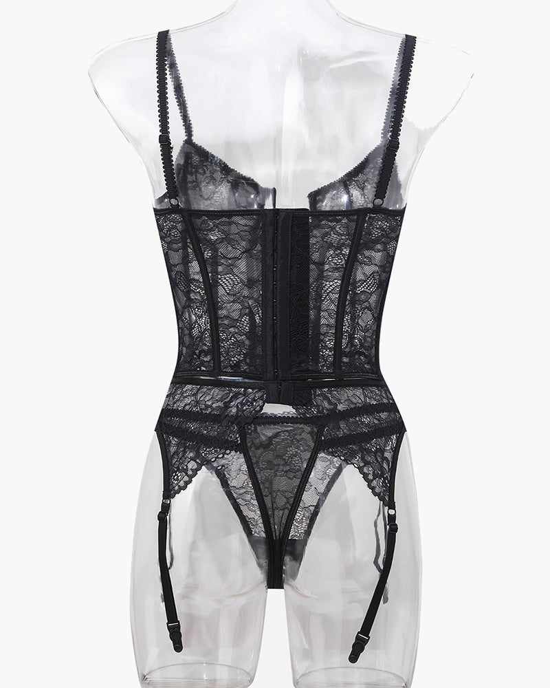 Black lace corset bra and garter panty set with vertical back paneling, rear view