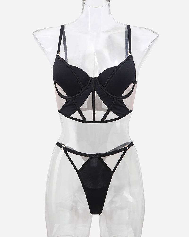 Black mesh push-up bra and thong set on mannequin with sheer cutout panels