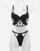 Black mesh push-up bra and thong set on mannequin with sheer cutout panels