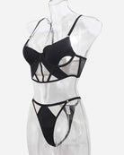 Black mesh push-up bra and thong set on mannequin, side view with sheer panels