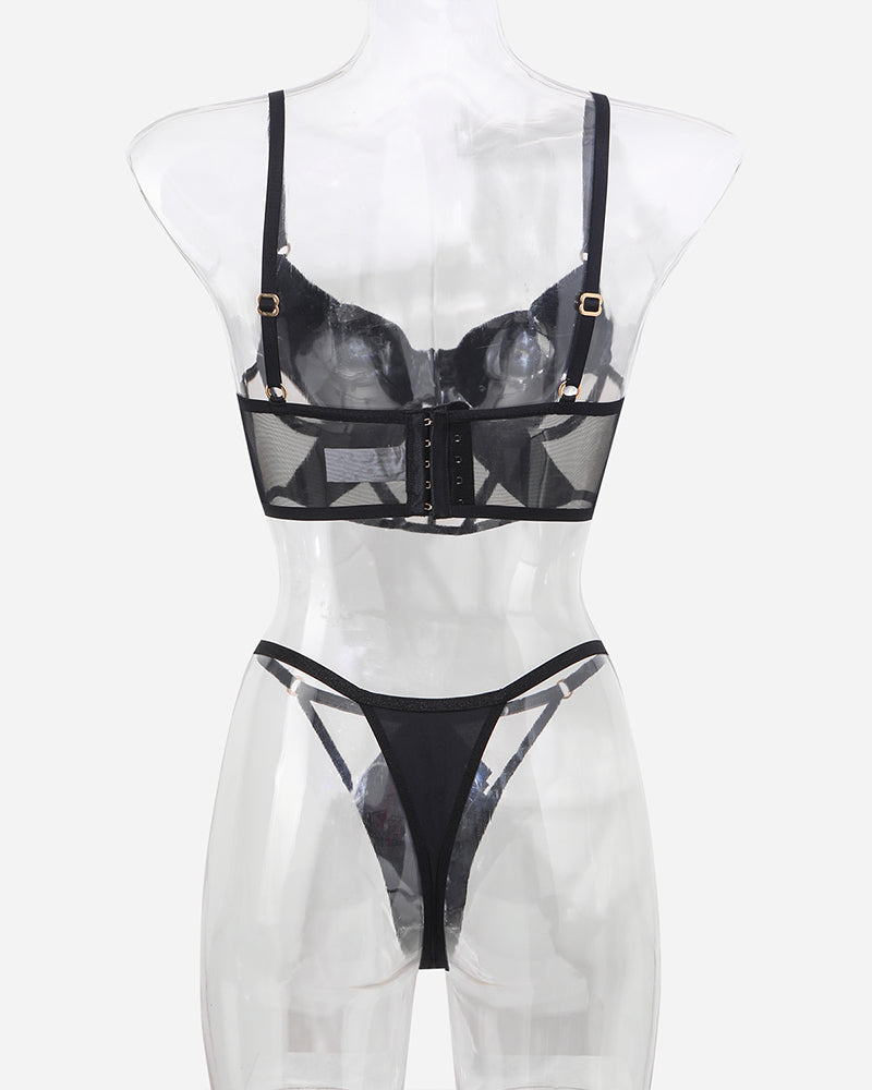 Black mesh push-up bra and thong set on mannequin, back band with hook closure