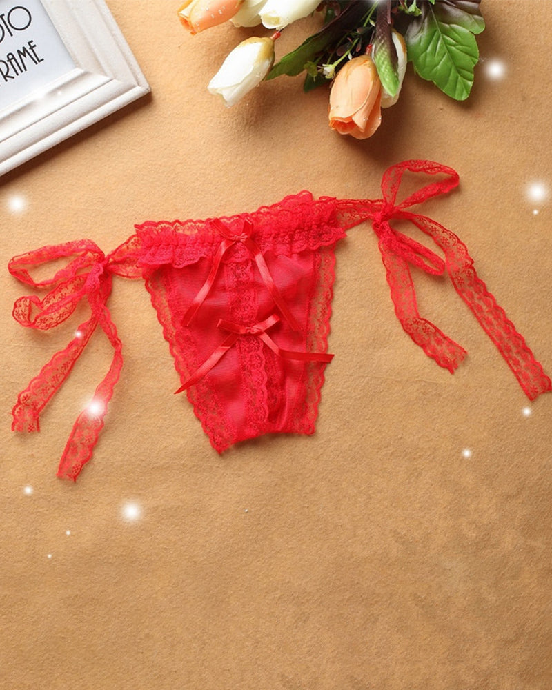 Red lace crotchless thong with lace-up side ties and bow at front.