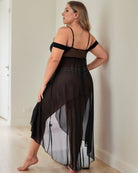 Plus size lace nightgown, black back view with thin straps and flowing sheer skirt panel.