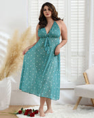 Plus size halter dress with bow, teal with white polka dots, V-neck and midi length