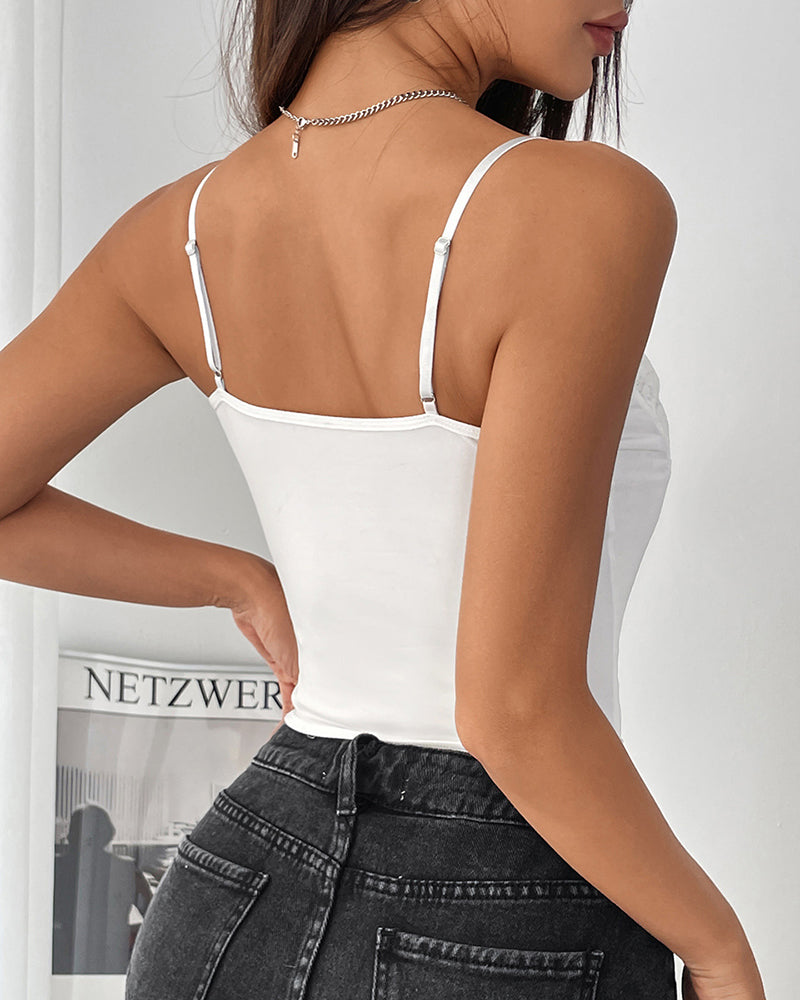 Back view of white corset bustier with thin straps and lace-up back design