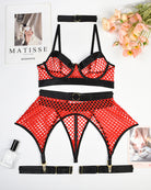 Red fishnet bra, garter belt, and thong set with ring hardware and adjustable straps