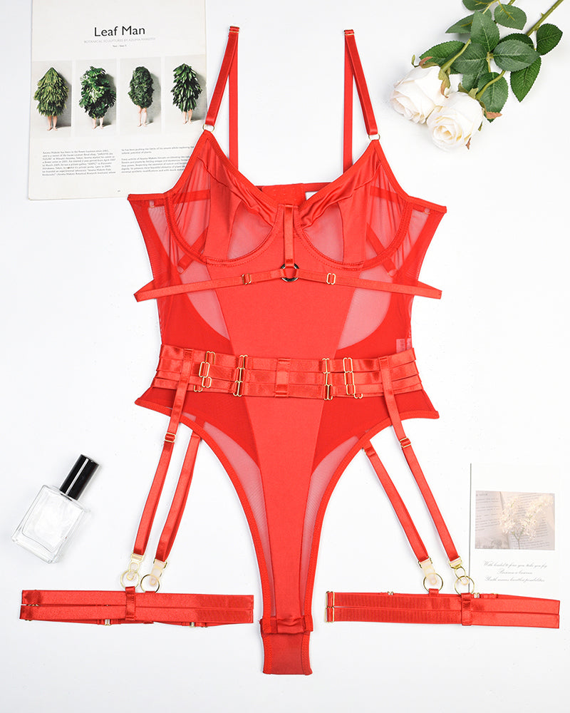 Red lingerie bodysuit set with garter straps laid flat, featuring mesh and buckles