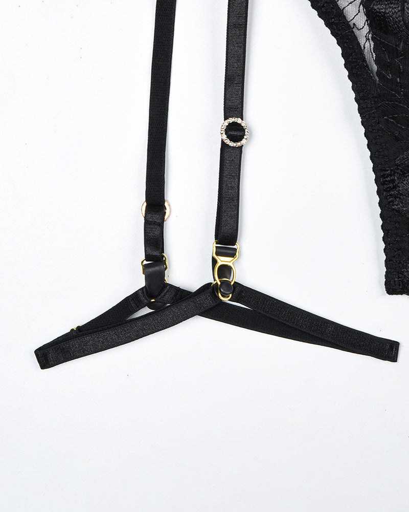 Black lace lingerie bra straps with adjustable rings and gem detail