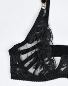 Black lace balconette bra with scalloped cups and jeweled strap hardware