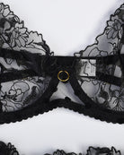 Black embroidered lace bra front with center ring closure and scalloped cups
