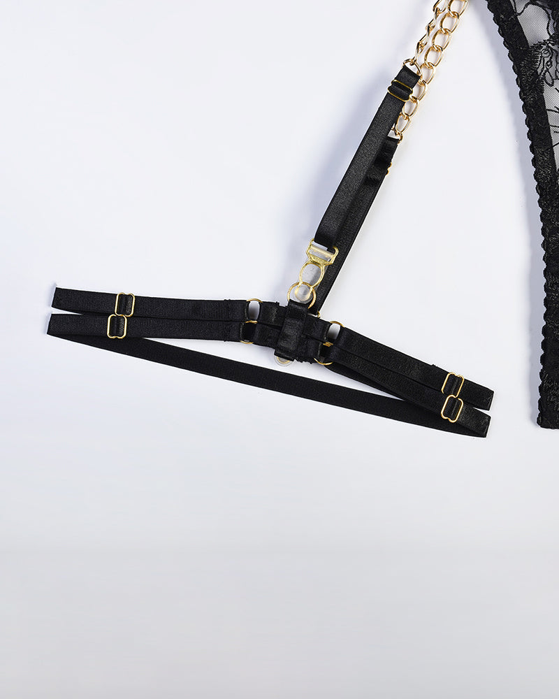 Black lace thong with gold-tone chain strap hardware and adjustable sliders
