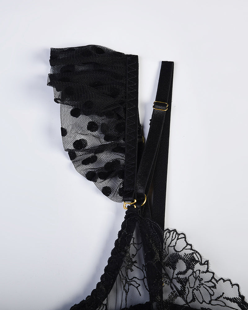Black mesh and lace lingerie strap with floral pattern and gold-tone buckle