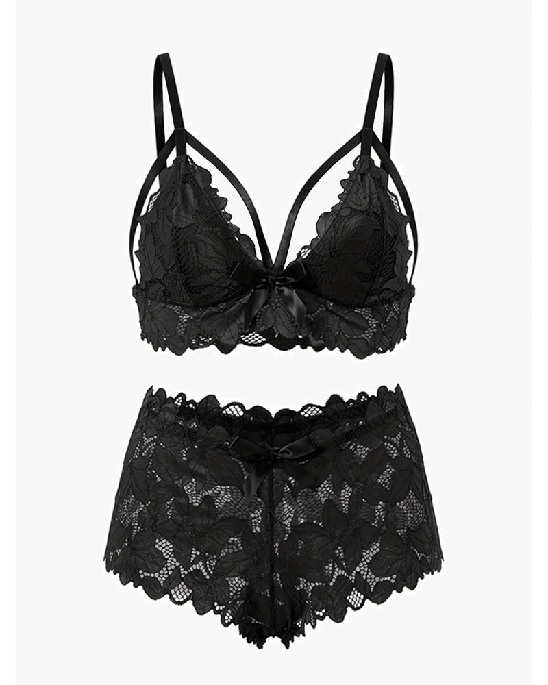 Black lace bra and panty set, front view, bow-knot appliques and scalloped trim