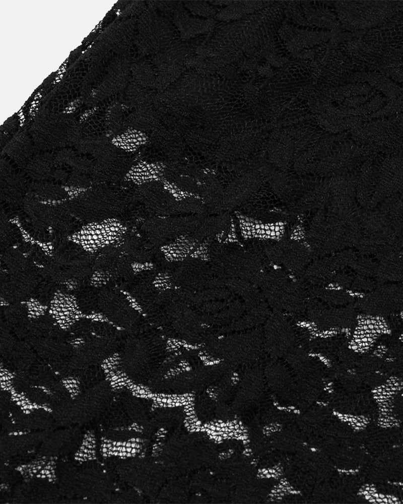 Black floral lace fabric close-up with intricate openwork pattern