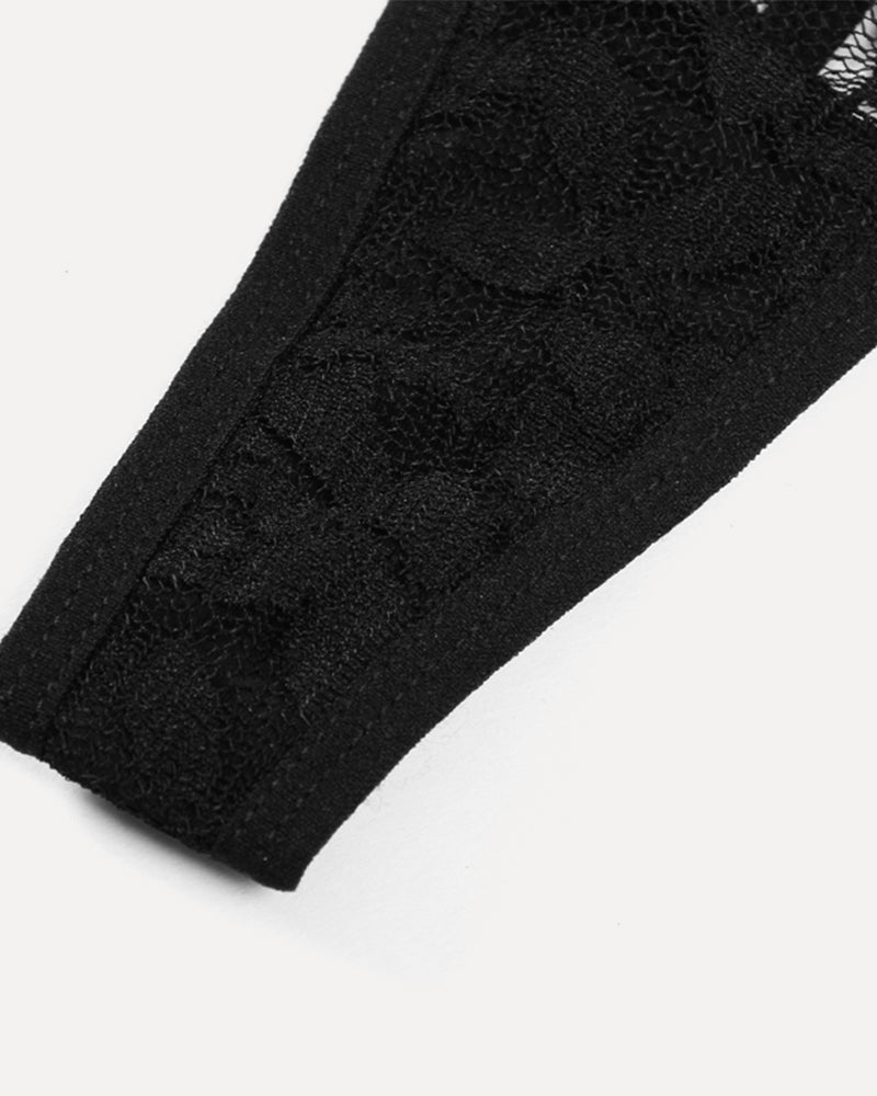Black lace long skirt with textured floral pattern and fitted silhouette