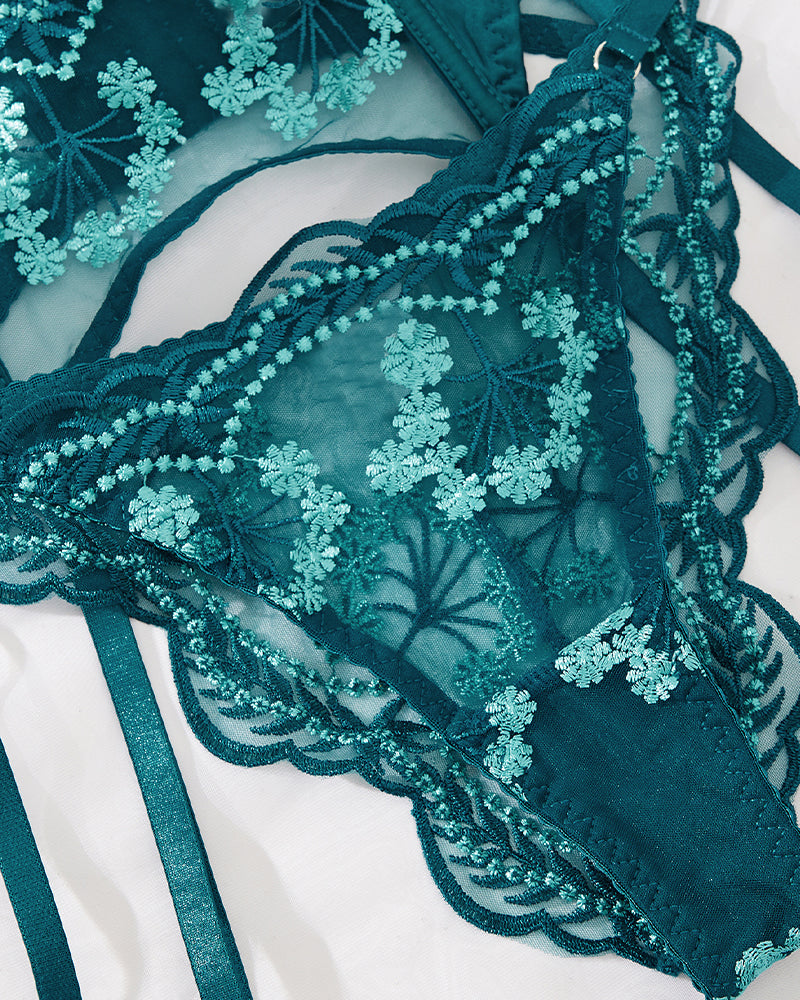 Green lace lingerie bralette with floral embroidery, scalloped edges and adjustable tie