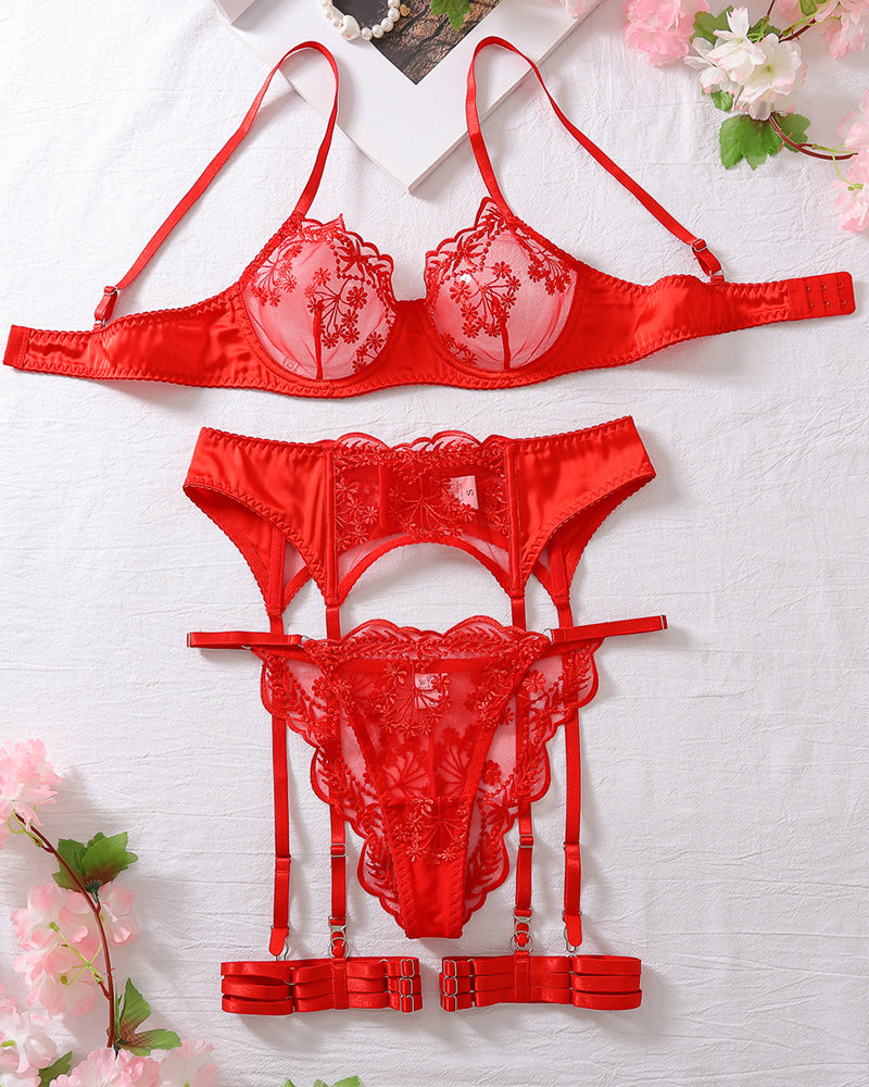 Red lace lingerie set with embroidered bra, garter belt, and thong with straps