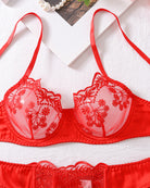 Red lace bra with underwire cups and floral embroidery, adjustable shoulder straps