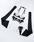 Lace lingerie set including push-up bra, garter belt, and matching underwear and straps