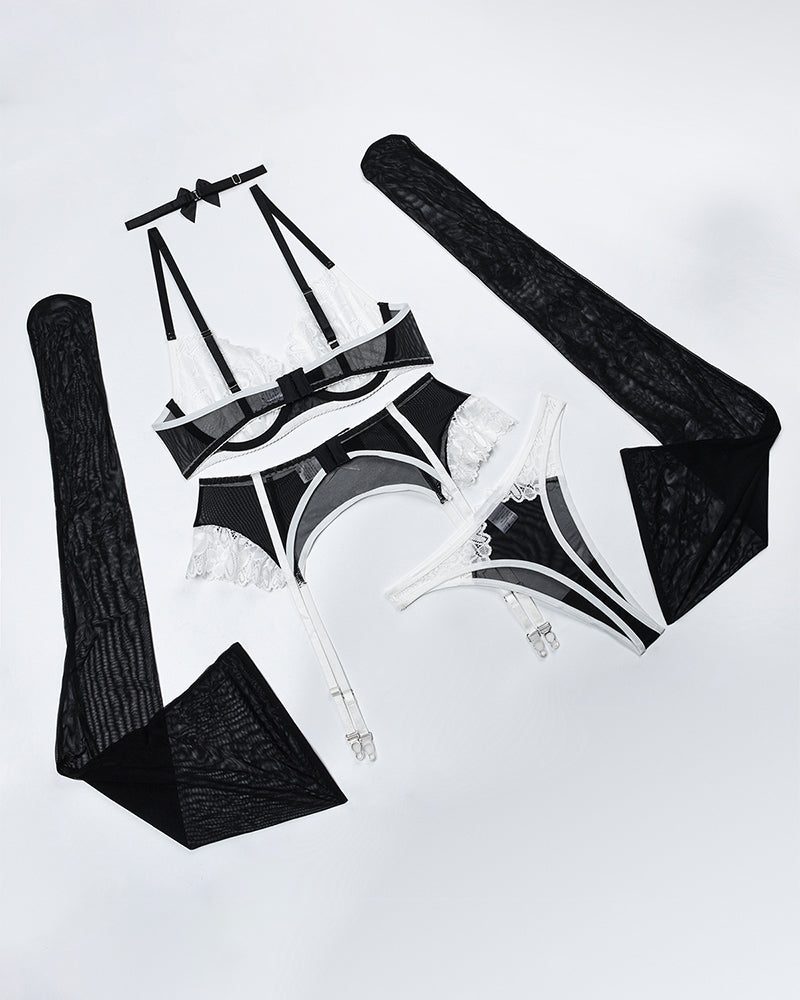 Lace lingerie set pieces with push-up bra and garter belt plus matching underwear and straps