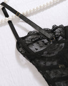 Black lace bra with adjustable straps and scalloped cups