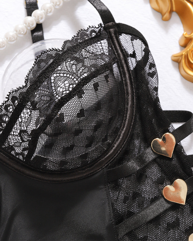 Black lace bra cups with heart charm accents and scalloped trim