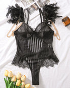 Black feather eyelash lace bodysuit with underwire cups, chain accents, and lace hem