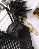 Black feather cuff with chain strap on eyelash lace bodysuit, lace cup panel