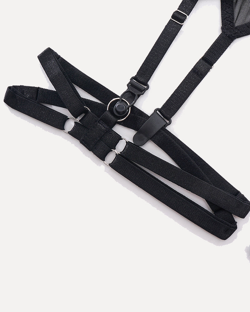 Black strappy top and skirt set with metal rings and adjustable buckles
