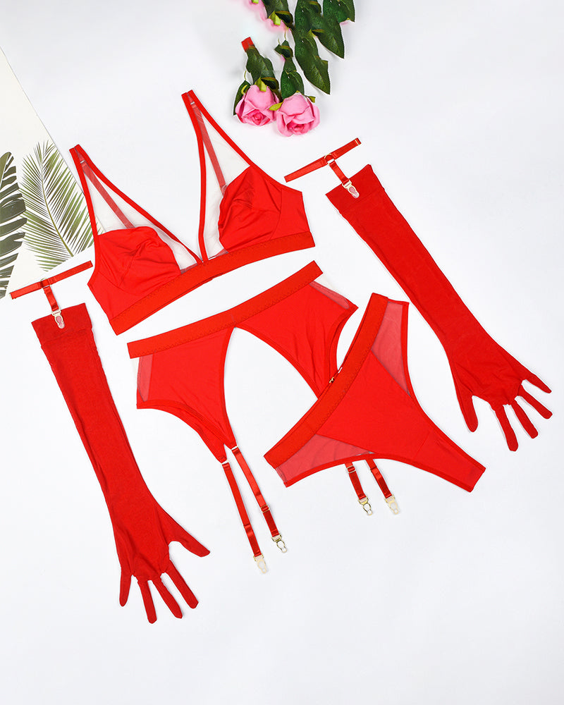Red strappy lingerie set with fingerless gloves, bra, panties, and garter straps