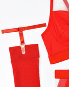 Red bra with elastic straps and adjustable garter straps with metal rings