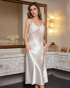 White satin nightdress with lace bodice and irregular stitch detailing, spaghetti straps.