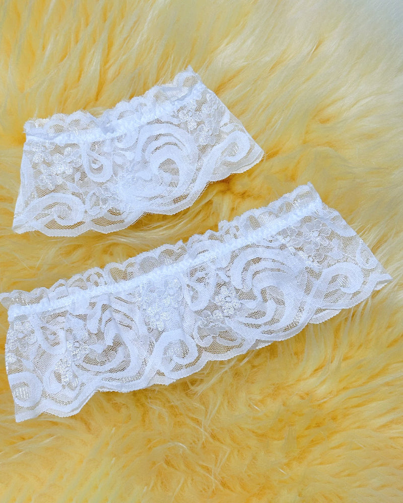 White lace wrist cuffs with scalloped edge