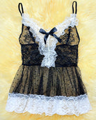 Maid costume dress set with black lace corset, white ruffled skirt, and satin bow