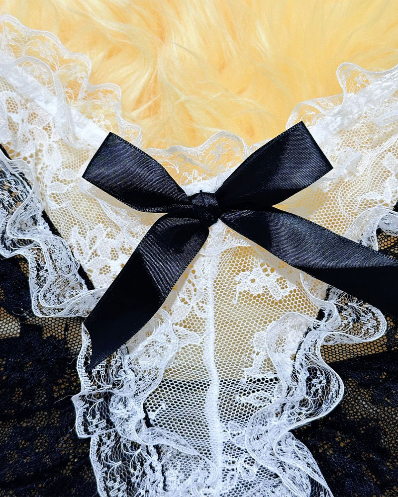 Maid dress lace bodice close-up with large black satin bow and white floral lace