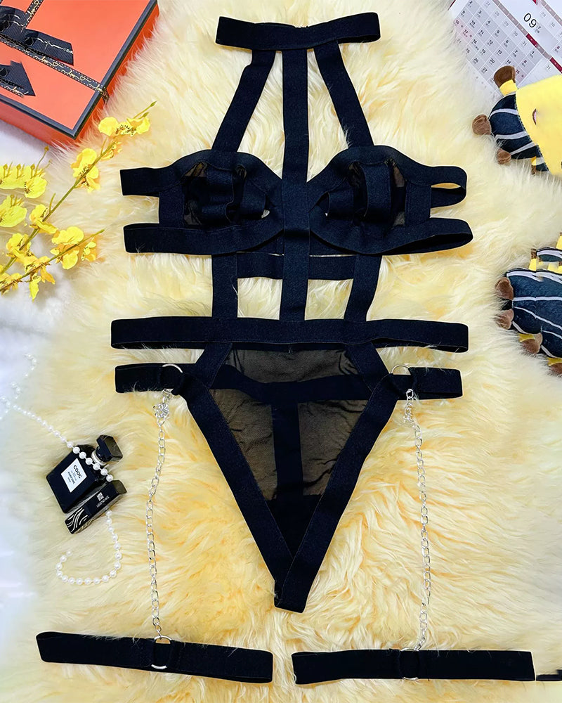 Dark mesh cut-out teddy lingerie set with garter straps and chain attachments