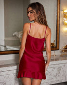 Wine red backless satin slip dress with spaghetti straps and short ruffled hem