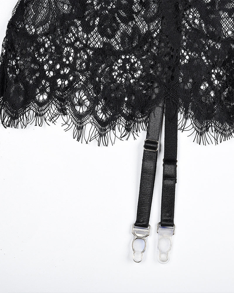 Black lace night dress hem with dangling fringe and garter strap clips