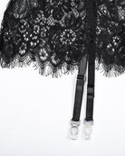 Black lace night dress hem with dangling fringe and garter strap clips