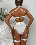 White mesh bodysuit with choker collar and garter belts, back view with suspender bands